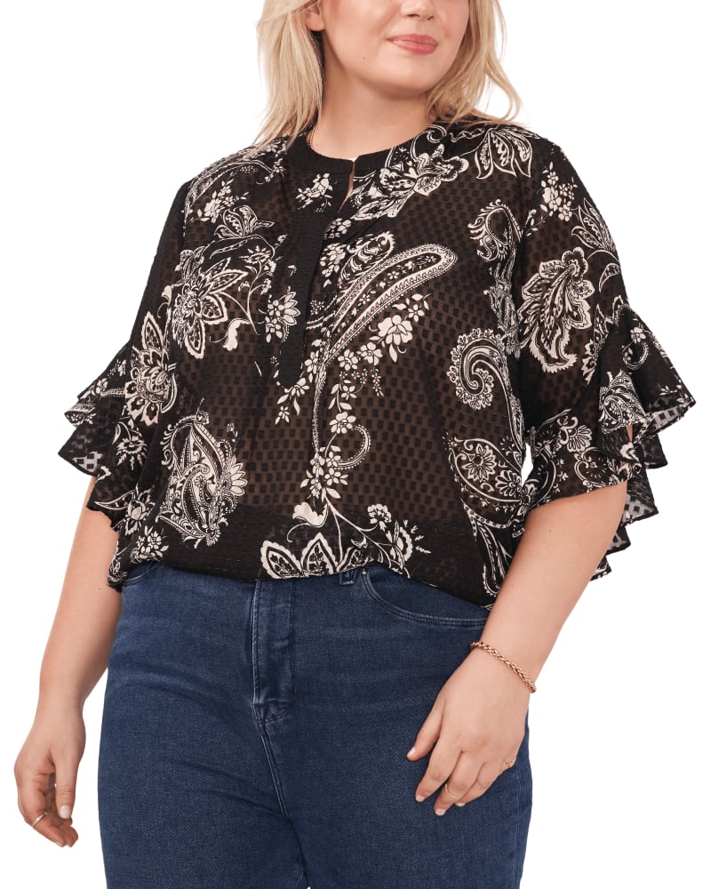 Front of a model wearing a size 1X Zayla Flutter Sleeve Top in Rich Black by Vince Camuto. | dia_product_style_image_id:261970